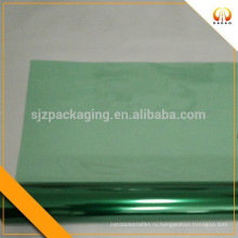 Зеленая прозрачная цветная пластиковая пленка для упаковки